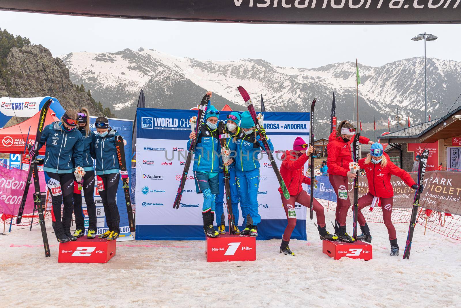 Arinsal, Andorra : 2021 March 3 : Final podium with the teams of France, Switzerland and Italy in the ISMF WC Championships Comapedrosa Andorra 2021- Relay Race Women.