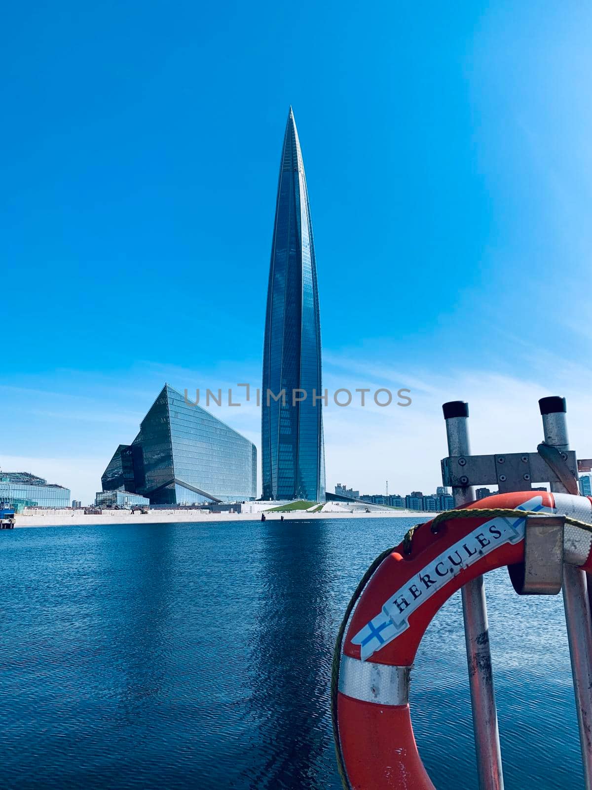 Russia, St.Petersburg, 26 May 2020: The skyscraper Lakhta center through a lifebuoy at day time, It is the highest skyscraper in Europe, completion of construction, sunny weather