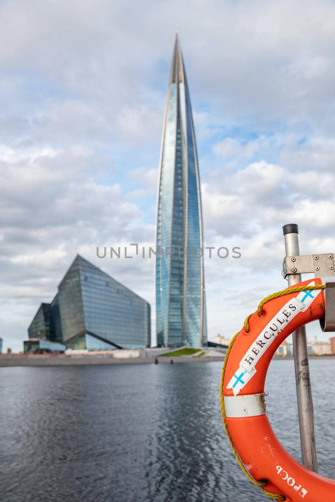 Russia, St.Petersburg, 06 July 2020: The skyscraper Lakhta center through a lifebuoy at day time, It is the highest skyscraper in Europe, completion of construction by vladimirdrozdin