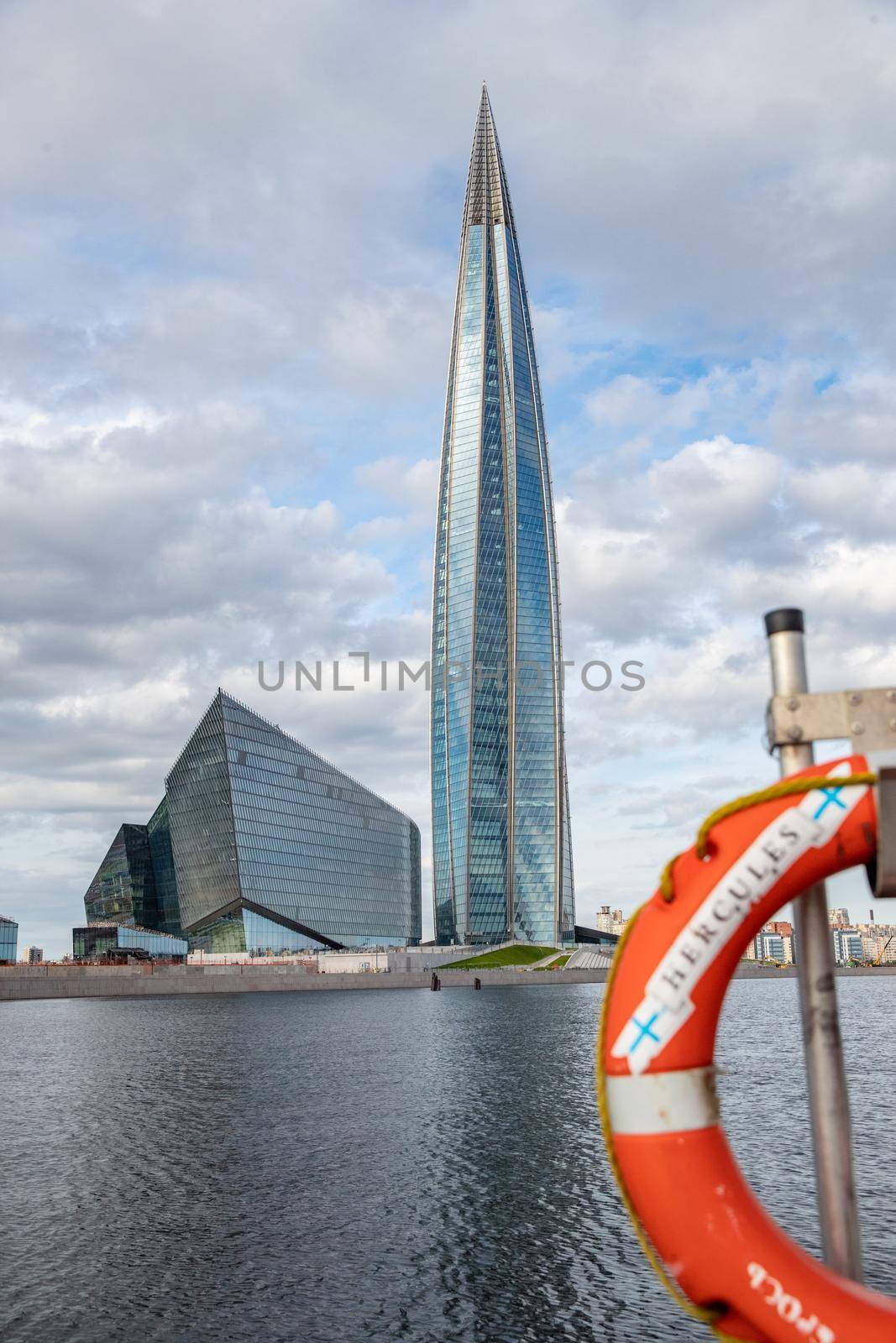 Russia, St.Petersburg, 06 July 2020: The skyscraper Lakhta center through a lifebuoy at day time, It is the highest skyscraper in Europe, completion of construction by vladimirdrozdin