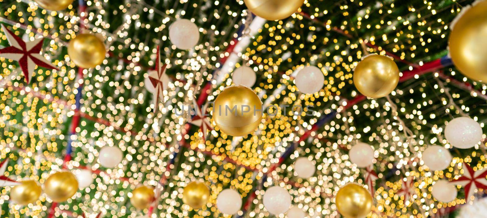 Facade New Year decoration. Closeup Christmas lights and balls .