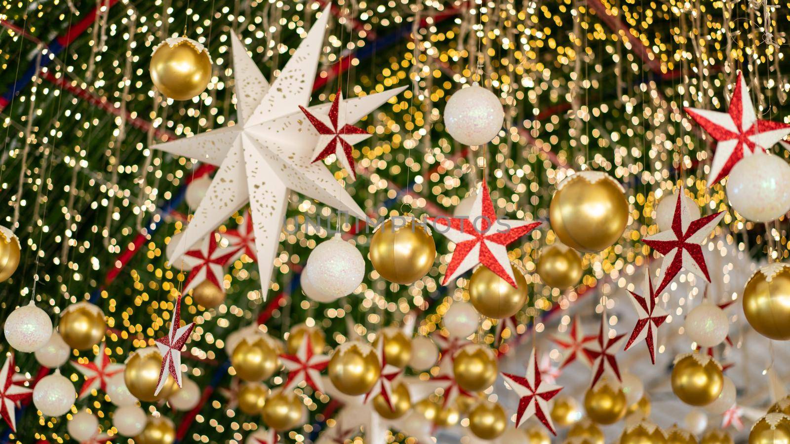 Facade New Year decoration. Closeup Christmas lights, stars and balls . by sirawit99
