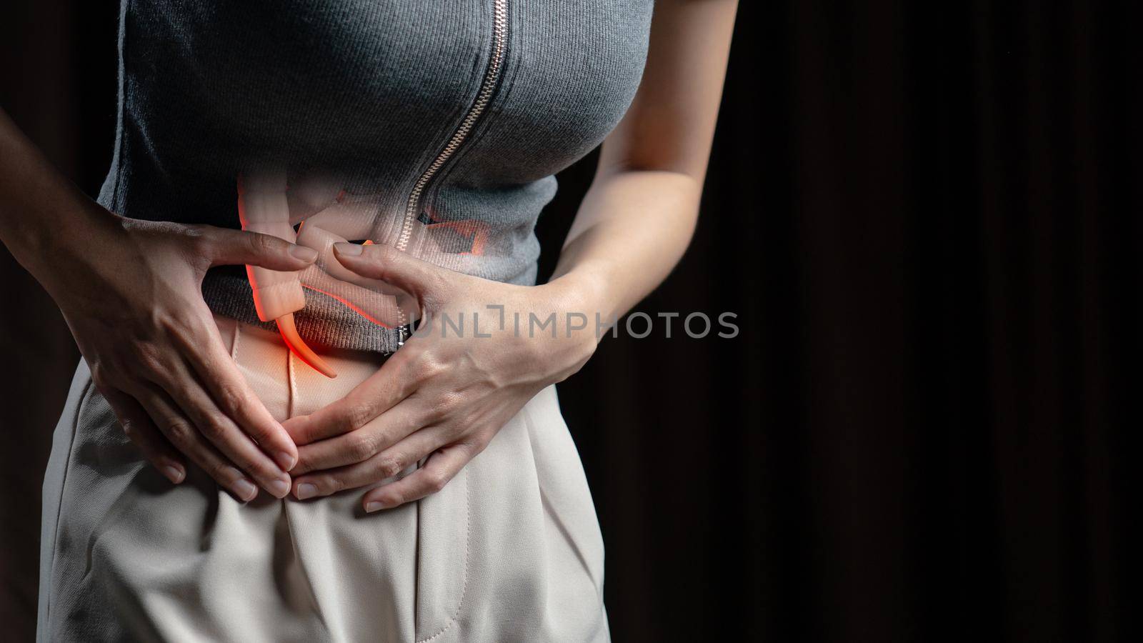 Abdominal pain woman, photo of large intestine on woman body, appendix pain. Health care concept. by sirawit99