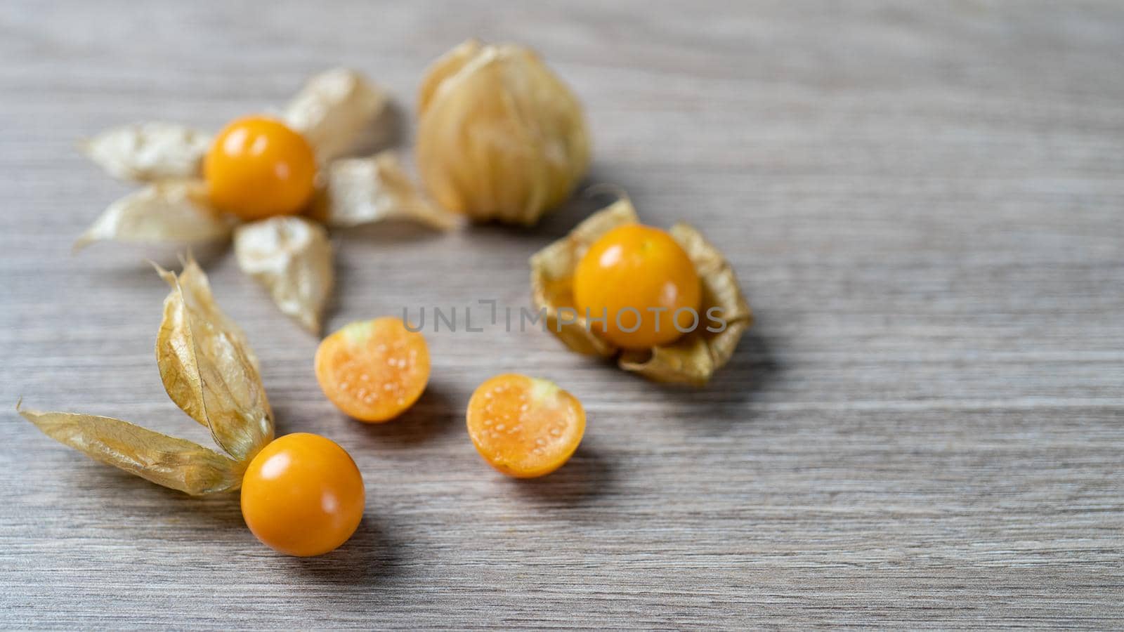 Top view pile of cape gooseberry fruit on the table.