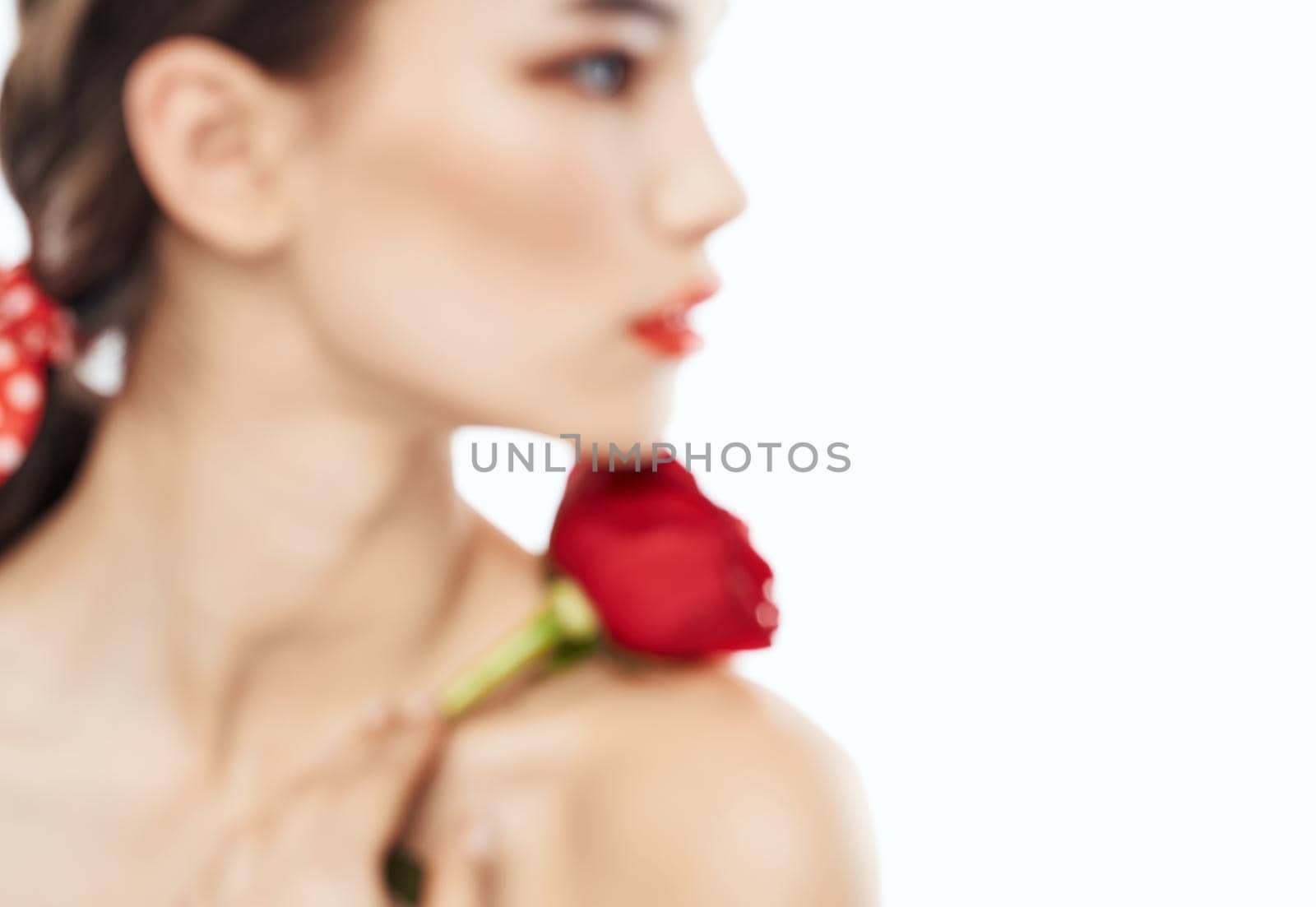 Charming people with bare shoulders red rose makeup eyeshadow. High quality photo