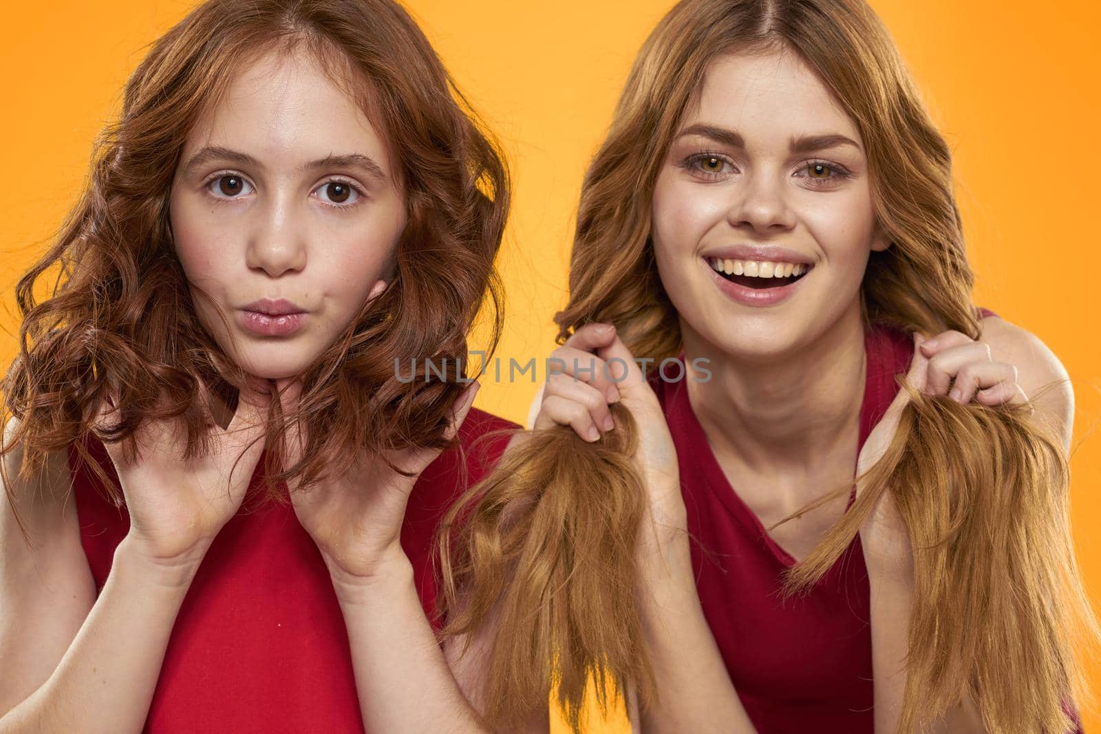 Family fun friendship emotions lifestyle yellow background. High quality photo