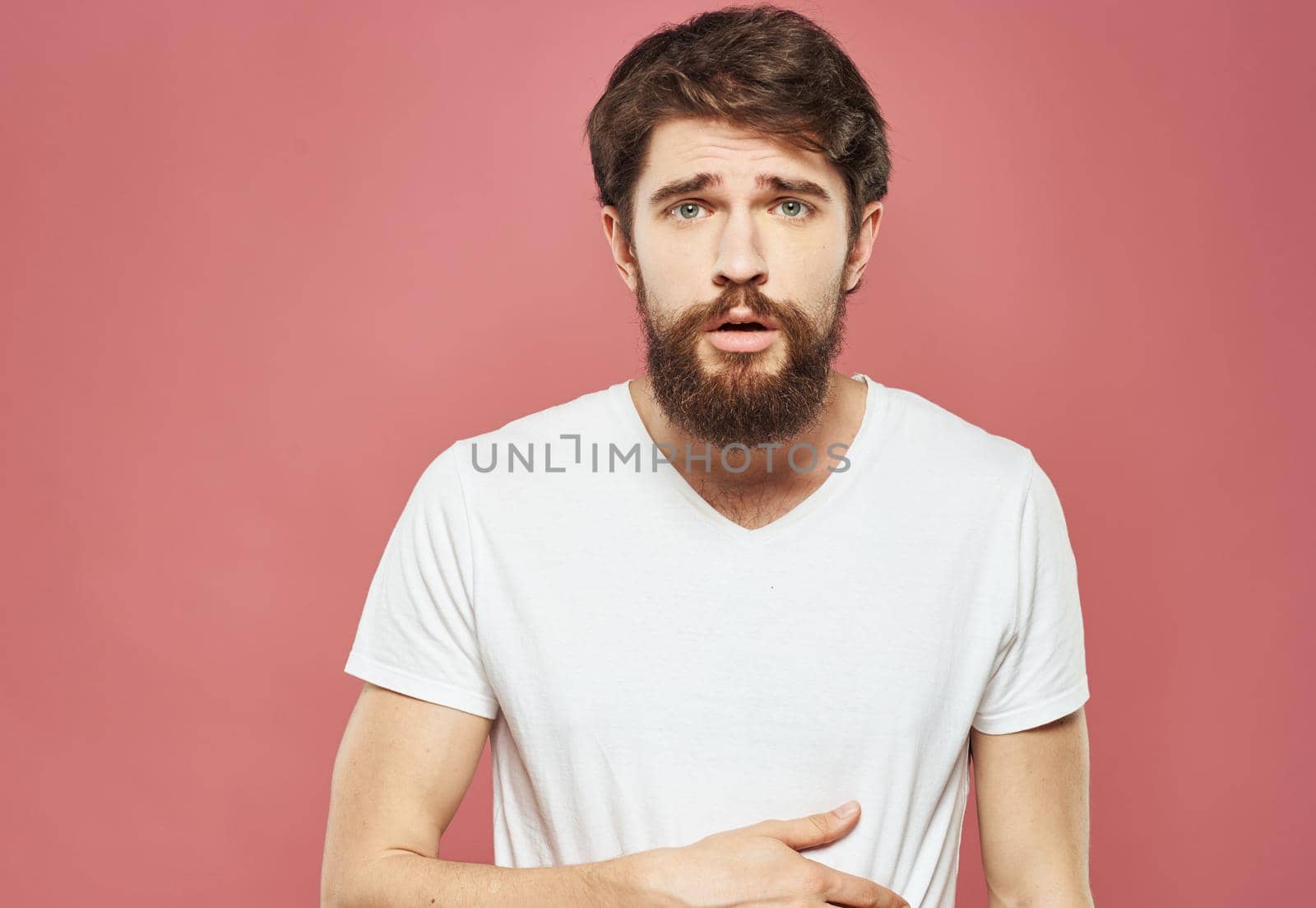 Man portrait white t-shirt pink background model bushy beard brunette by SHOTPRIME