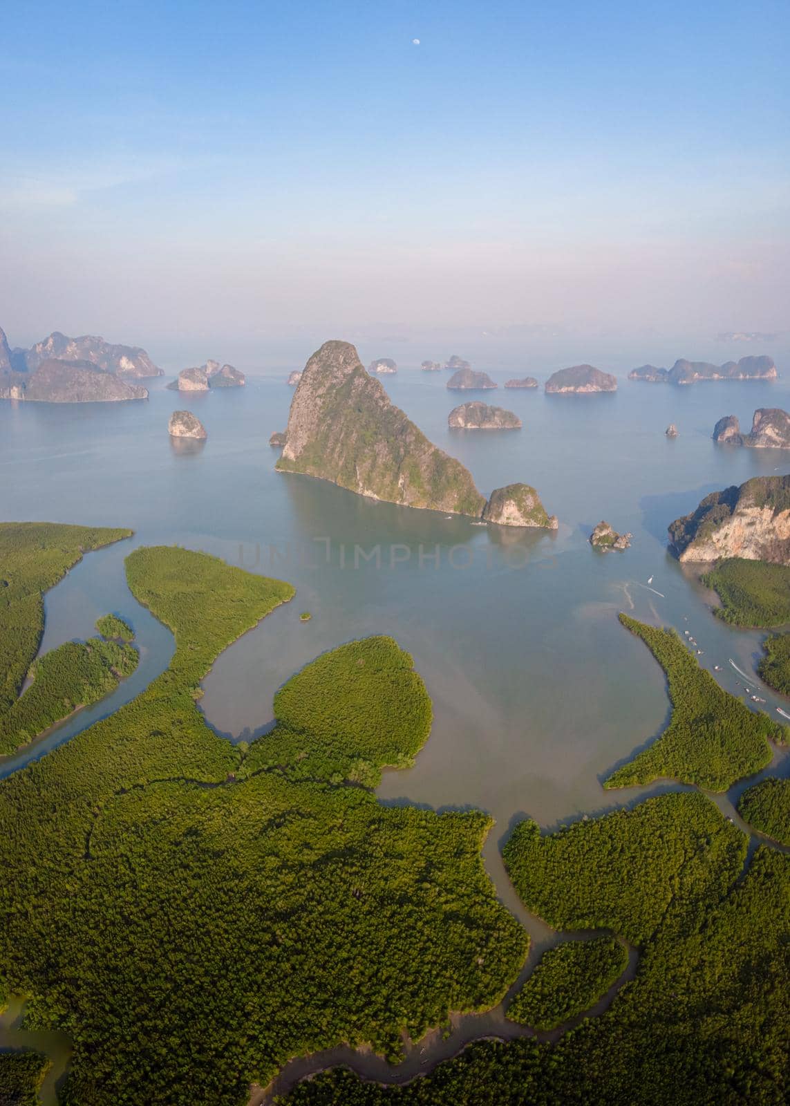 panorama view of Sametnangshe, view of mountains in Phangnga bay with mangrove forest in Andaman sea with evening twilight sky, travel destination in Phangnga, Thailand. South East Asia