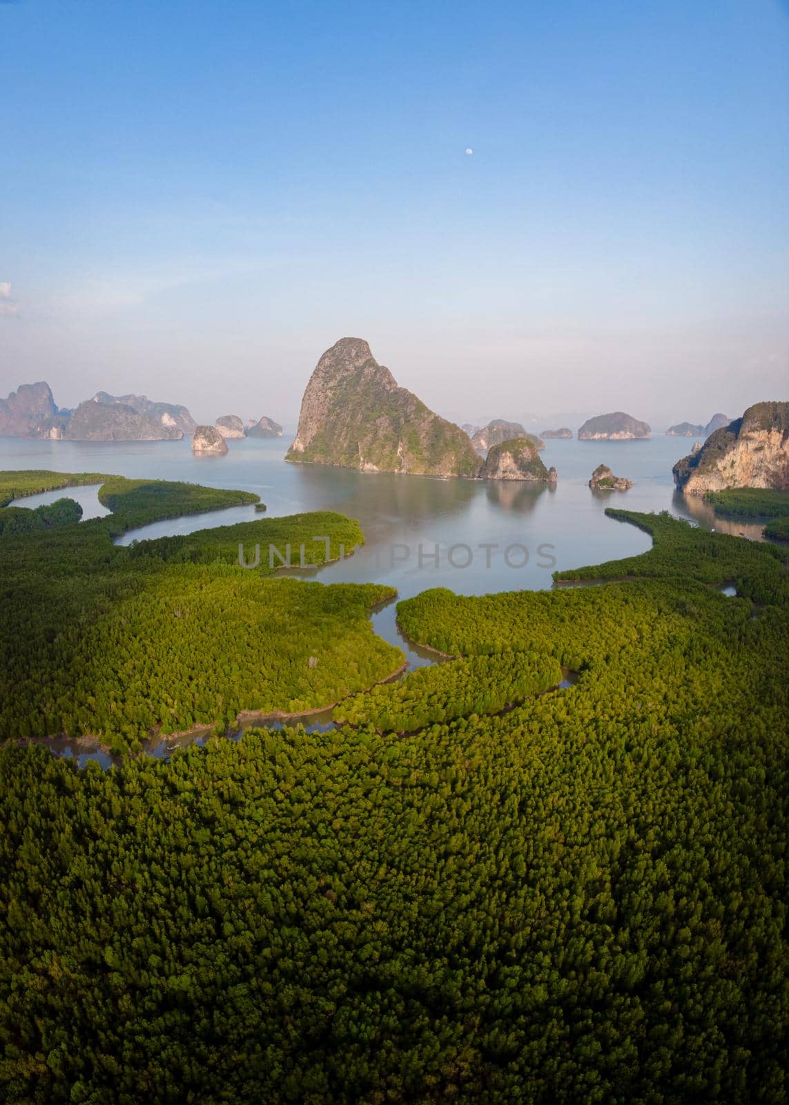 panorama view of Sametnangshe, view of mountains in Phangnga bay with mangrove forest in Andaman sea with evening twilight sky, travel destination in Phangnga, Thailand. South East Asia