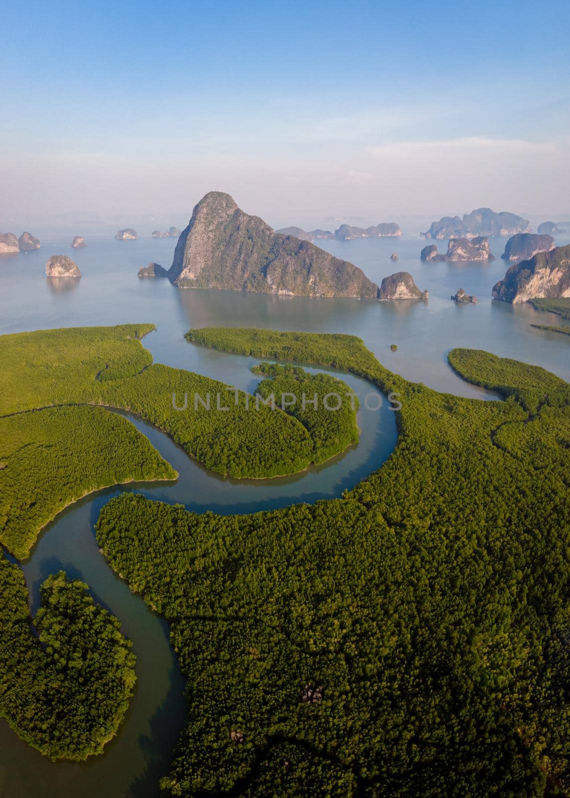 panorama view of Sametnangshe, view of mountains in Phangnga bay with mangrove forest in Andaman sea with evening twilight sky, travel destination in Phangnga, Thailand. South East Asia