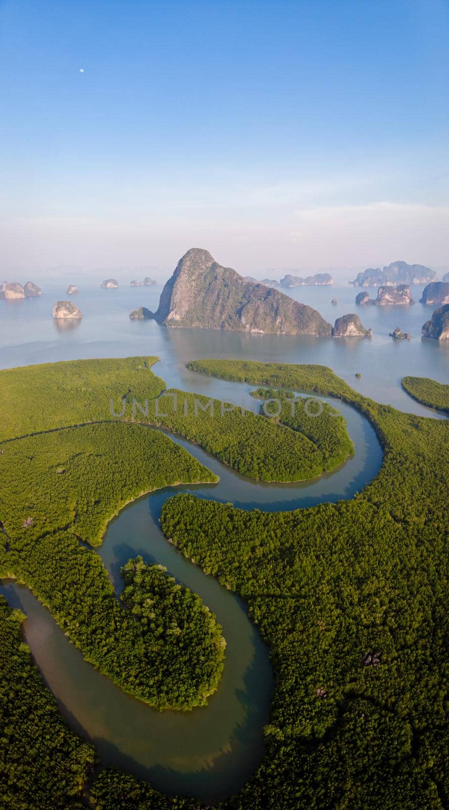 panorama view of Sametnangshe, view of mountains in Phangnga bay with mangrove forest in Andaman sea with evening twilight sky, travel destination in Phangnga, Thailand. South East Asia