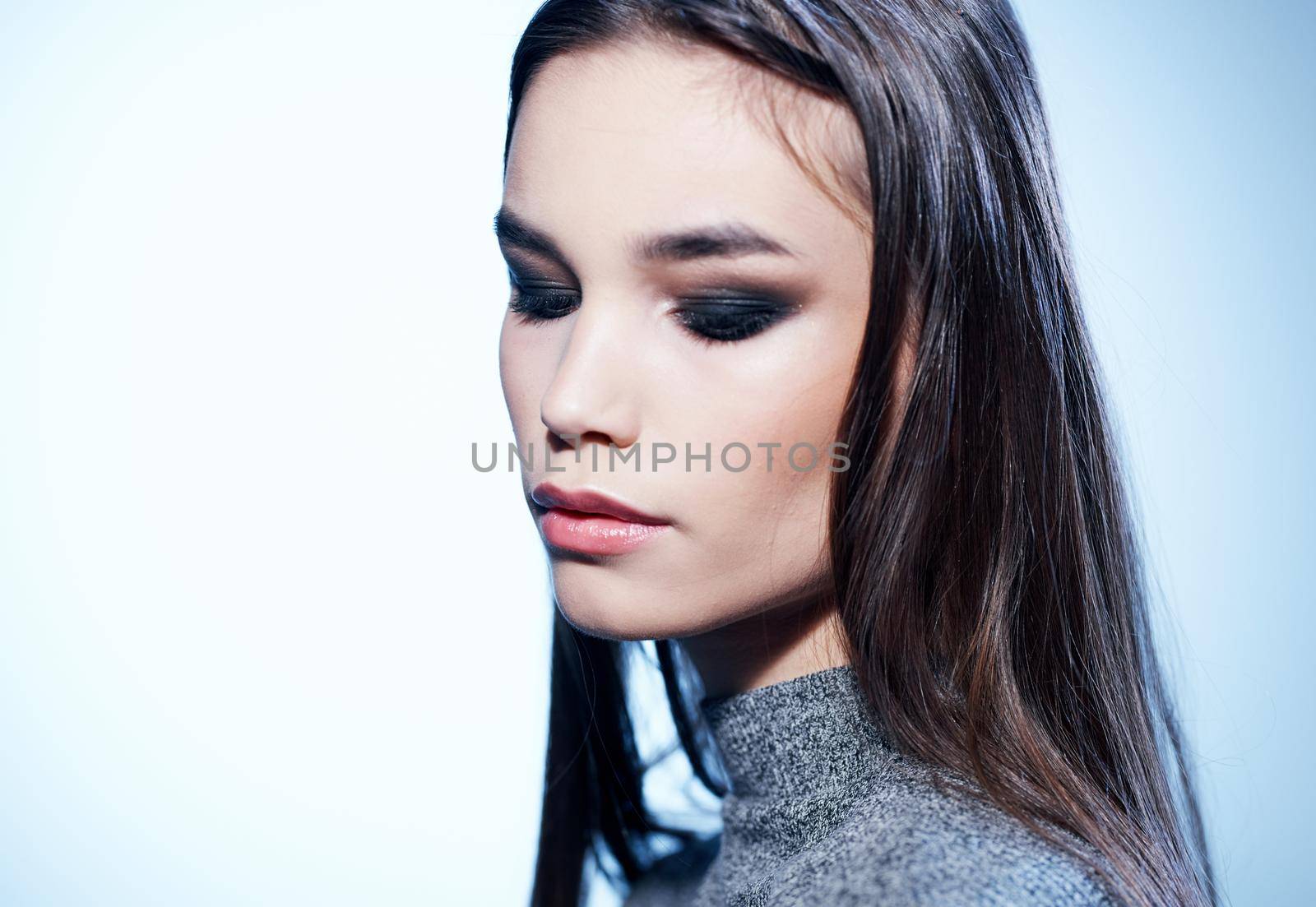 Side view of charming woman model with evening make-up by SHOTPRIME