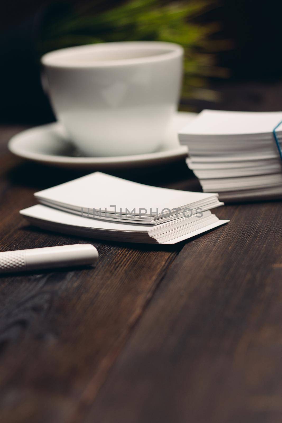 coffee cup on the table business cards office desktop business documents by SHOTPRIME