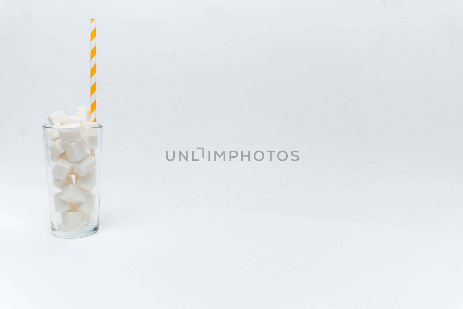 sugar in a glass with a straw cocktail sweets energy. High quality photo
