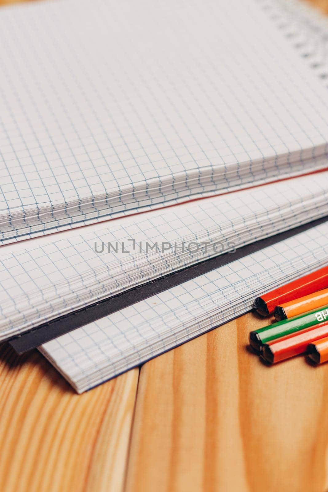 notepads colorful pencils office school items paper work by SHOTPRIME