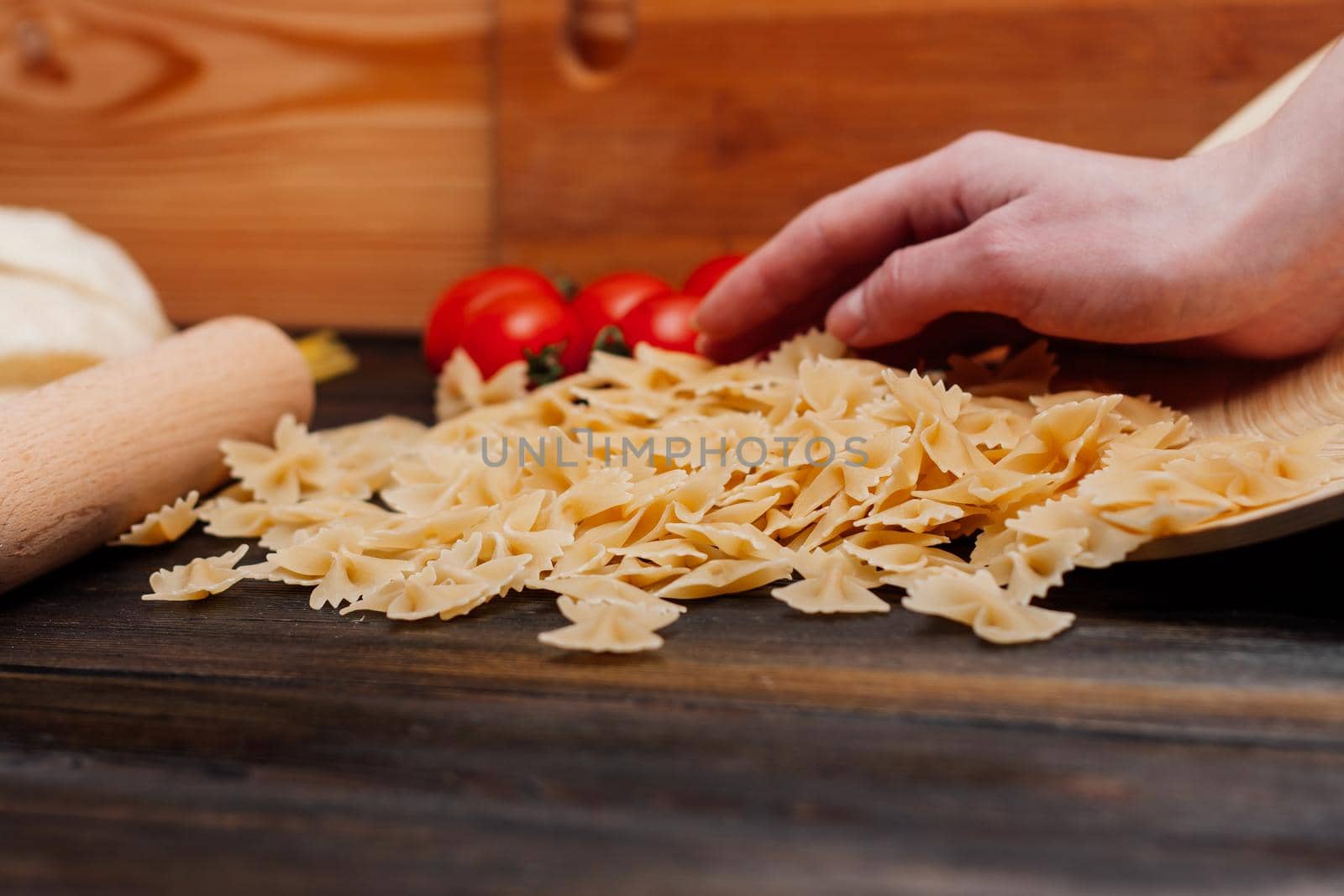 pasta italian cuisine ingredients cooking sauce wooden table. High quality photo