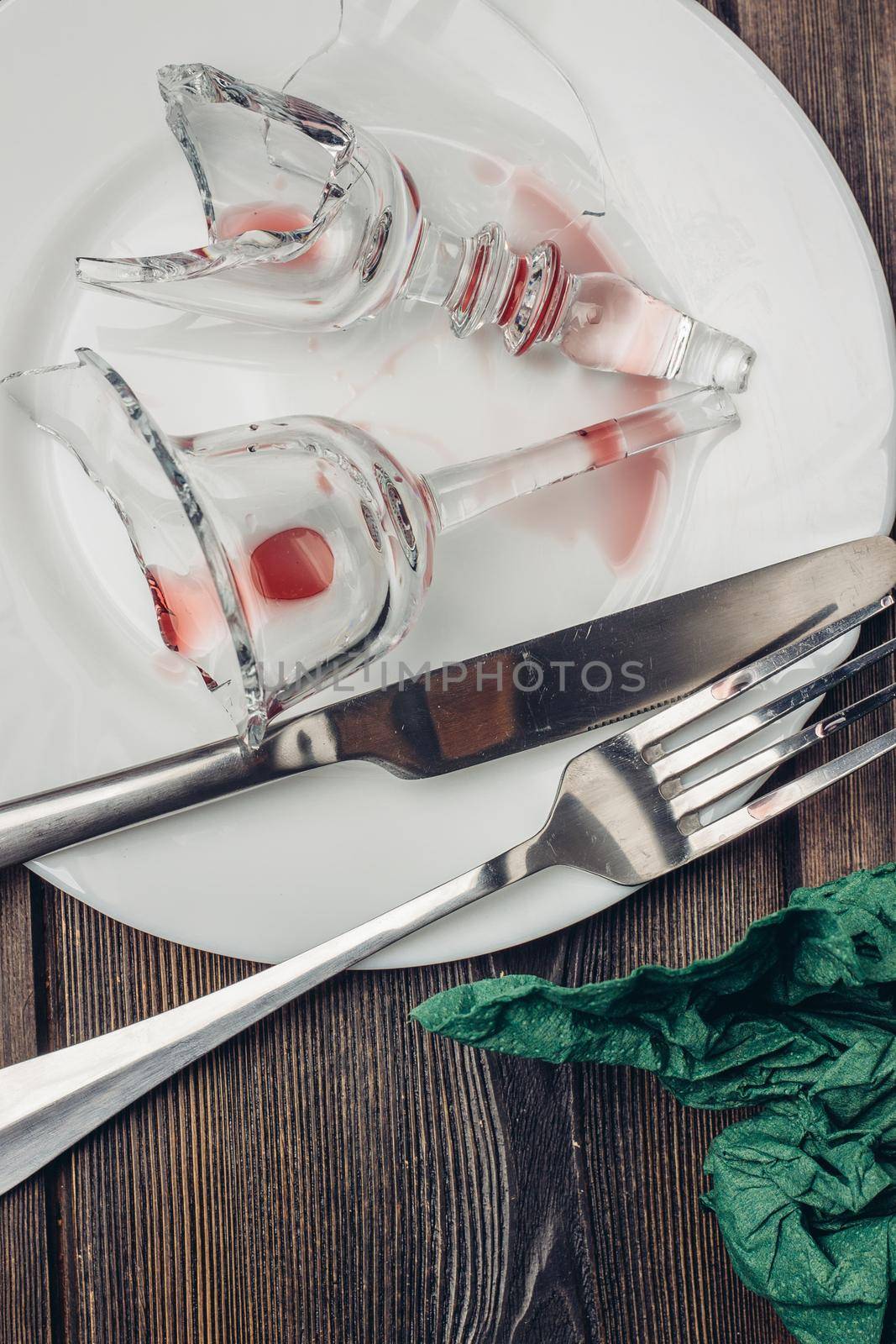 broken glass on plates kitchenware table setting tableware. High quality photo