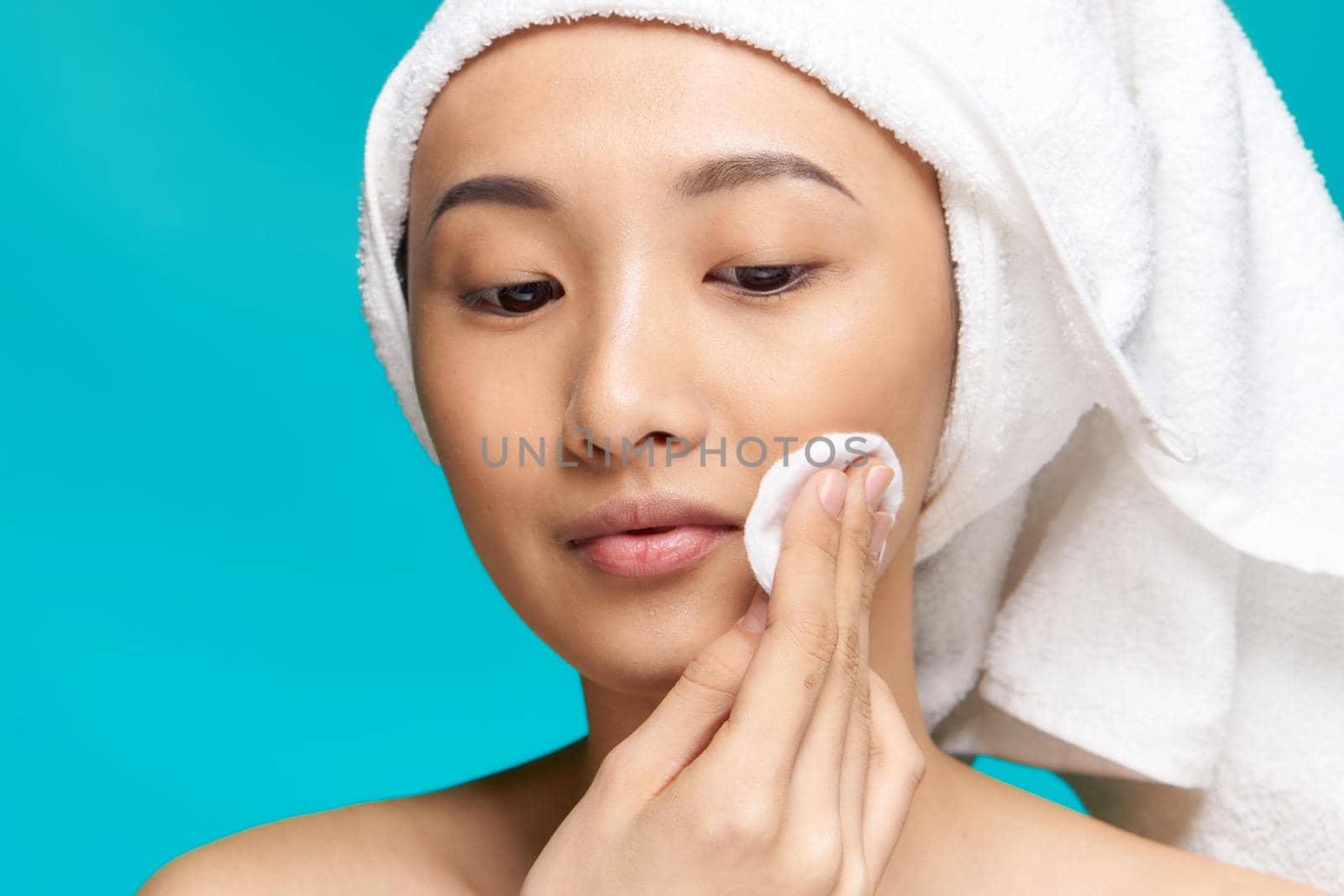 asian woman naked shoulders clean skin scrub close-up. High quality photo