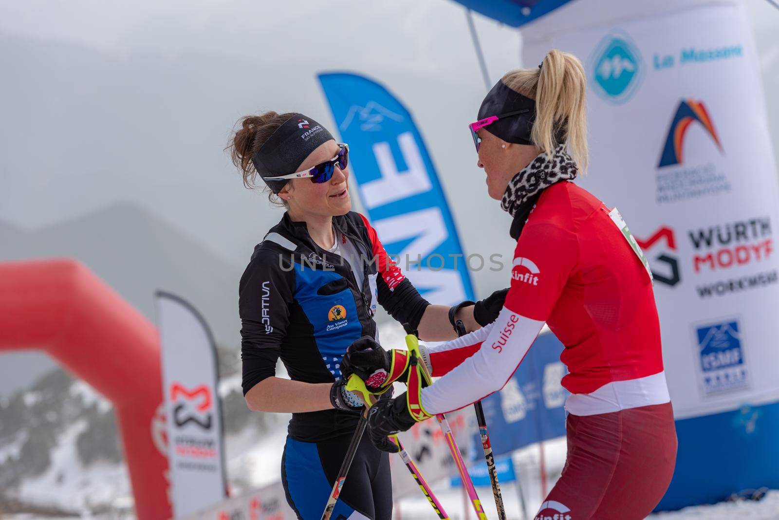 Arinsal, Andorra: 2021 March 4 :  KREUZER Victoria SUI and GACHET MOLLARET Axelle FRA in the finish line ISMF WC Championships Comapedrosa Andorra 2021 Vertical Race.