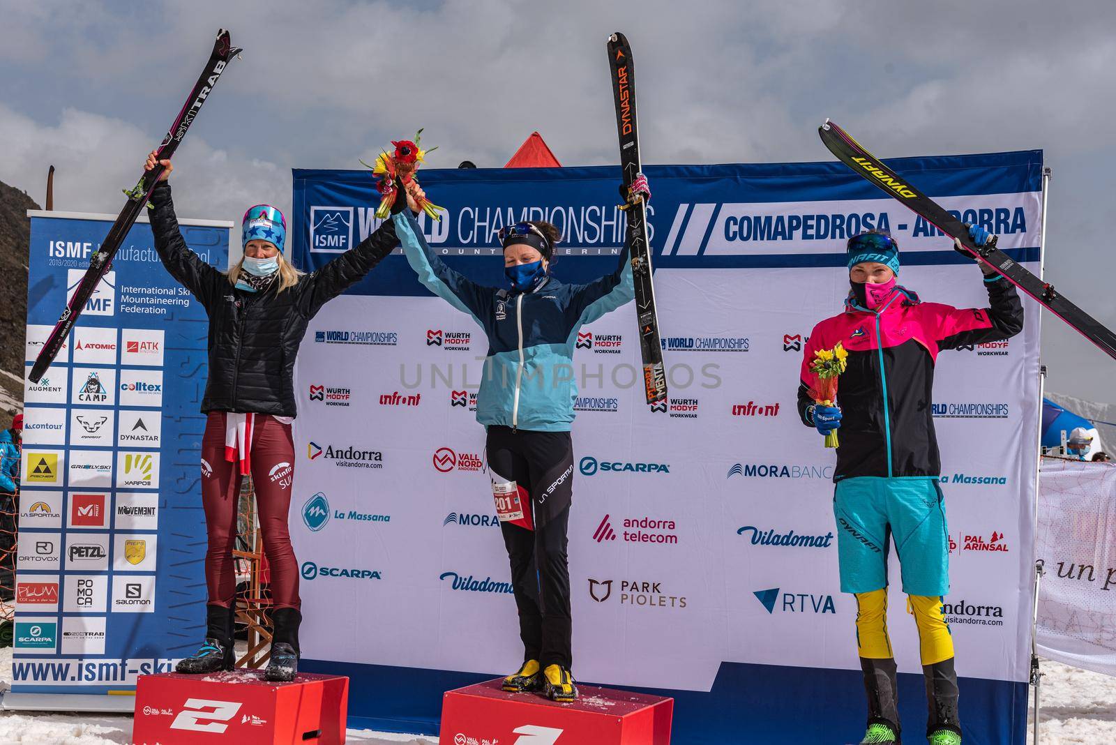 Arinsal, Andorra: 2021 March 4 : KREUZER Victoria SUI, GACHET MOLLARET Axelle FRA and ALEXANDERSSON Tove SWE in the finish line ISMF WC Championships Comapedrosa Andorra 2021 Vertical Race.