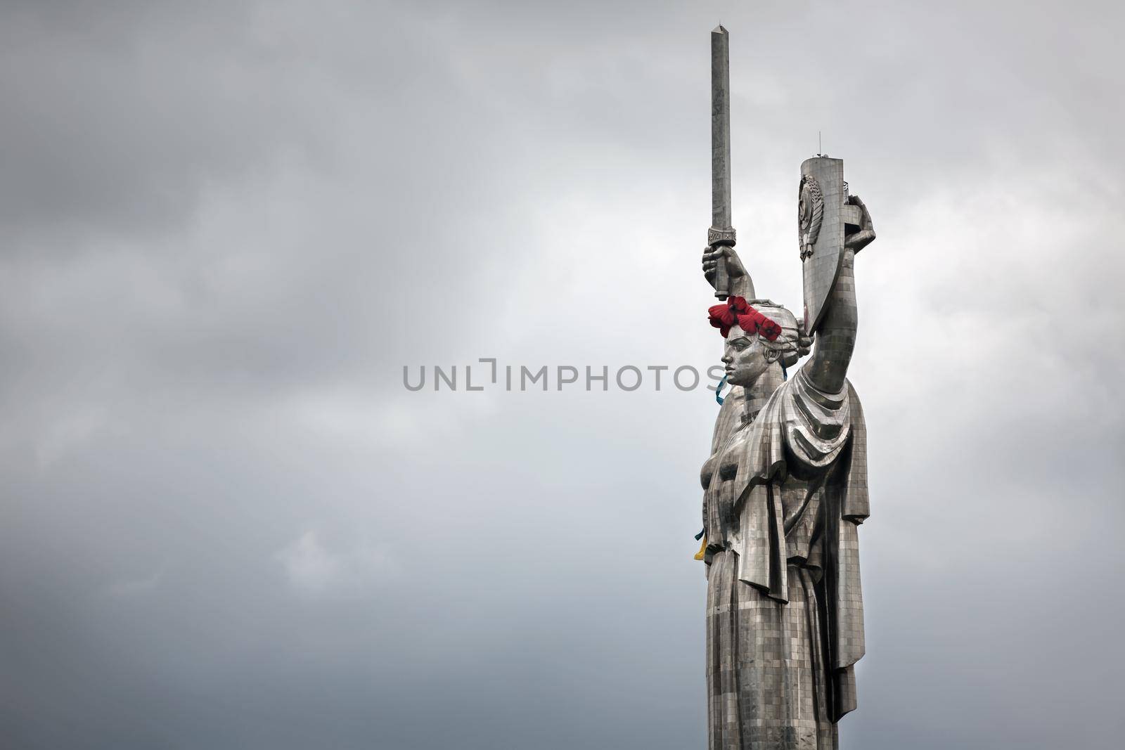 KIEV, UKRAINE - May. 08, 2015: Poppies of memory. The monument "Mother Motherland" decorated with a wreath of poppies on the Day of Remembrance and Reconciliation in Kiev