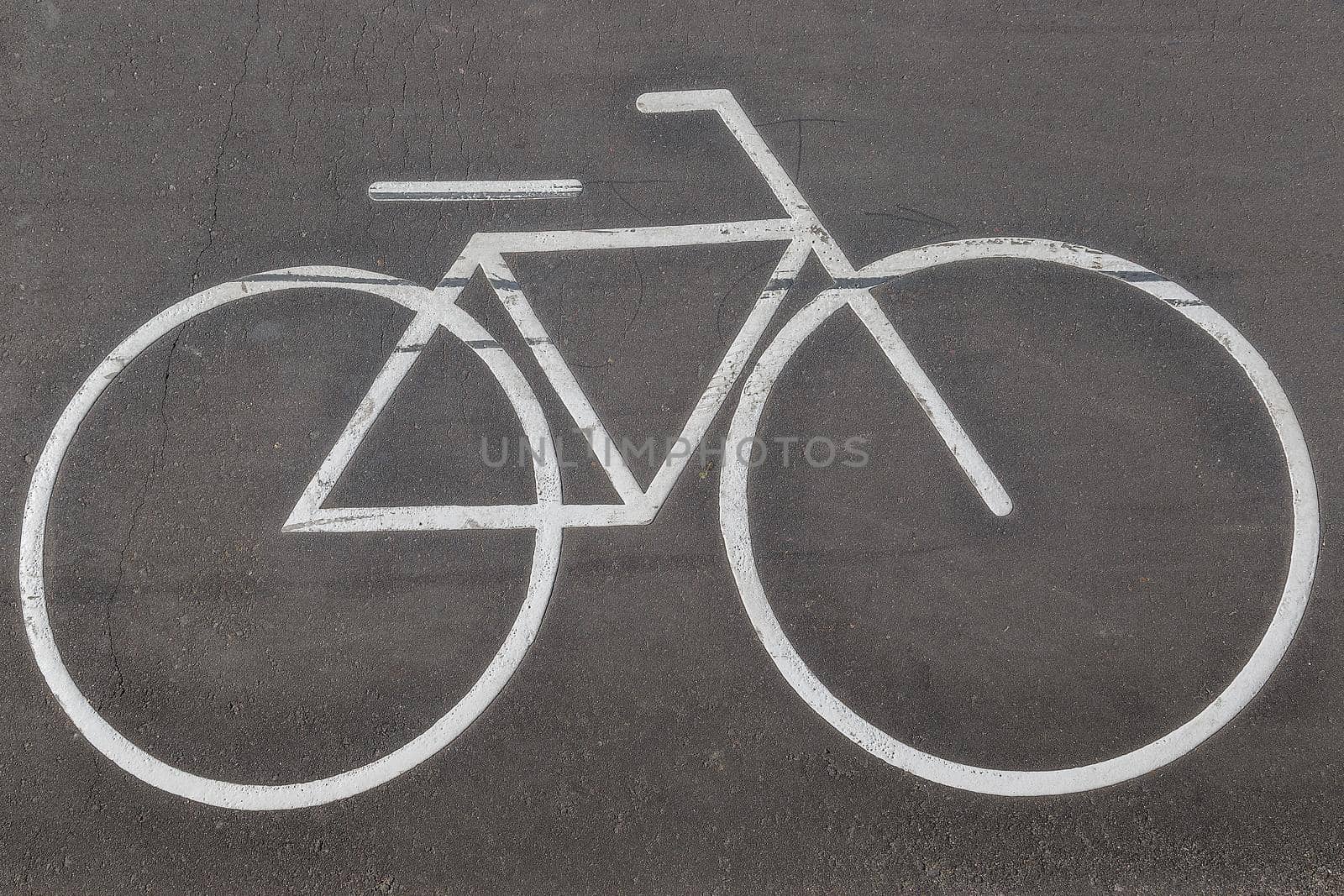 Bicycle sign on the road. Road markings, bike lane indication by galinasharapova