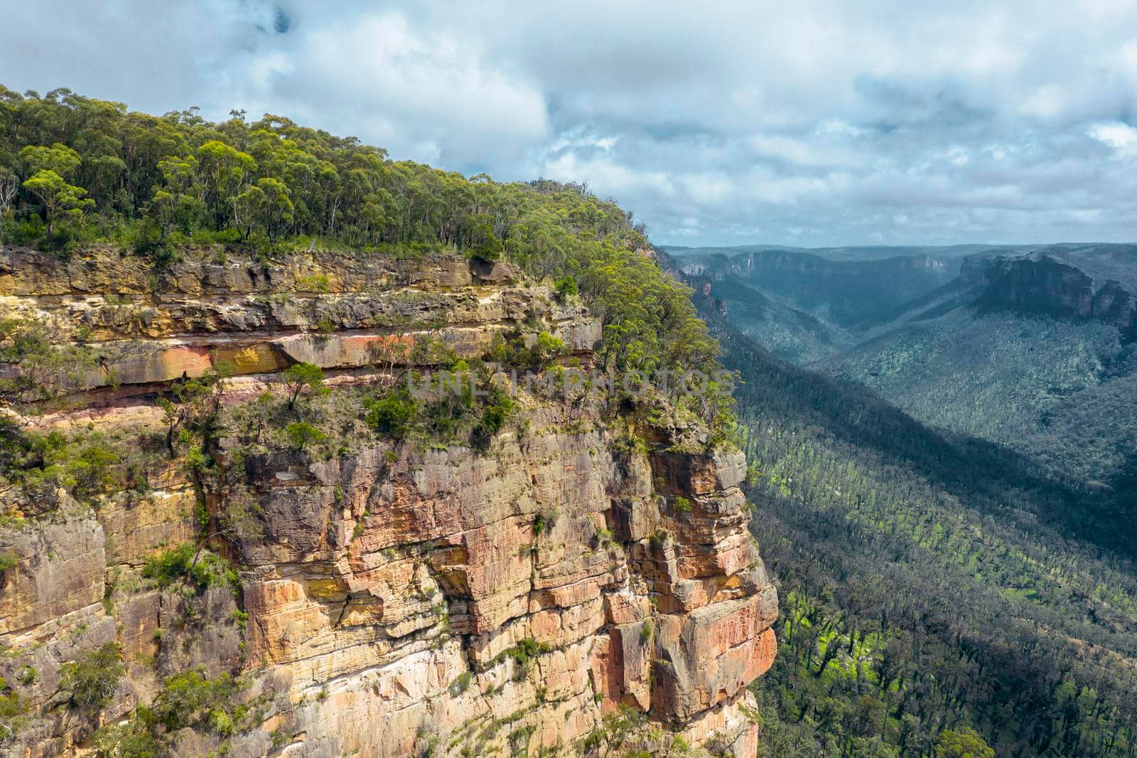 Aerial view of a cliff face in the Grose Valley near Blackheath in The Blue Mountains in regional New South Wales in Australia