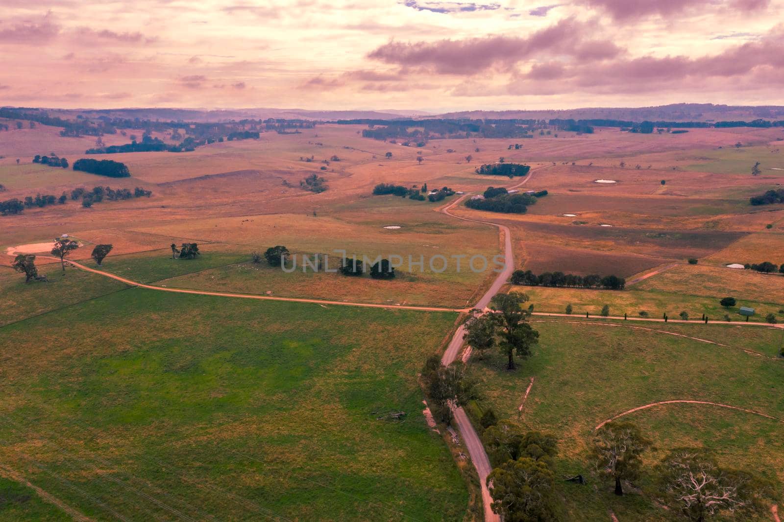 Aerial view of green farmland in regional Australia by WittkePhotos