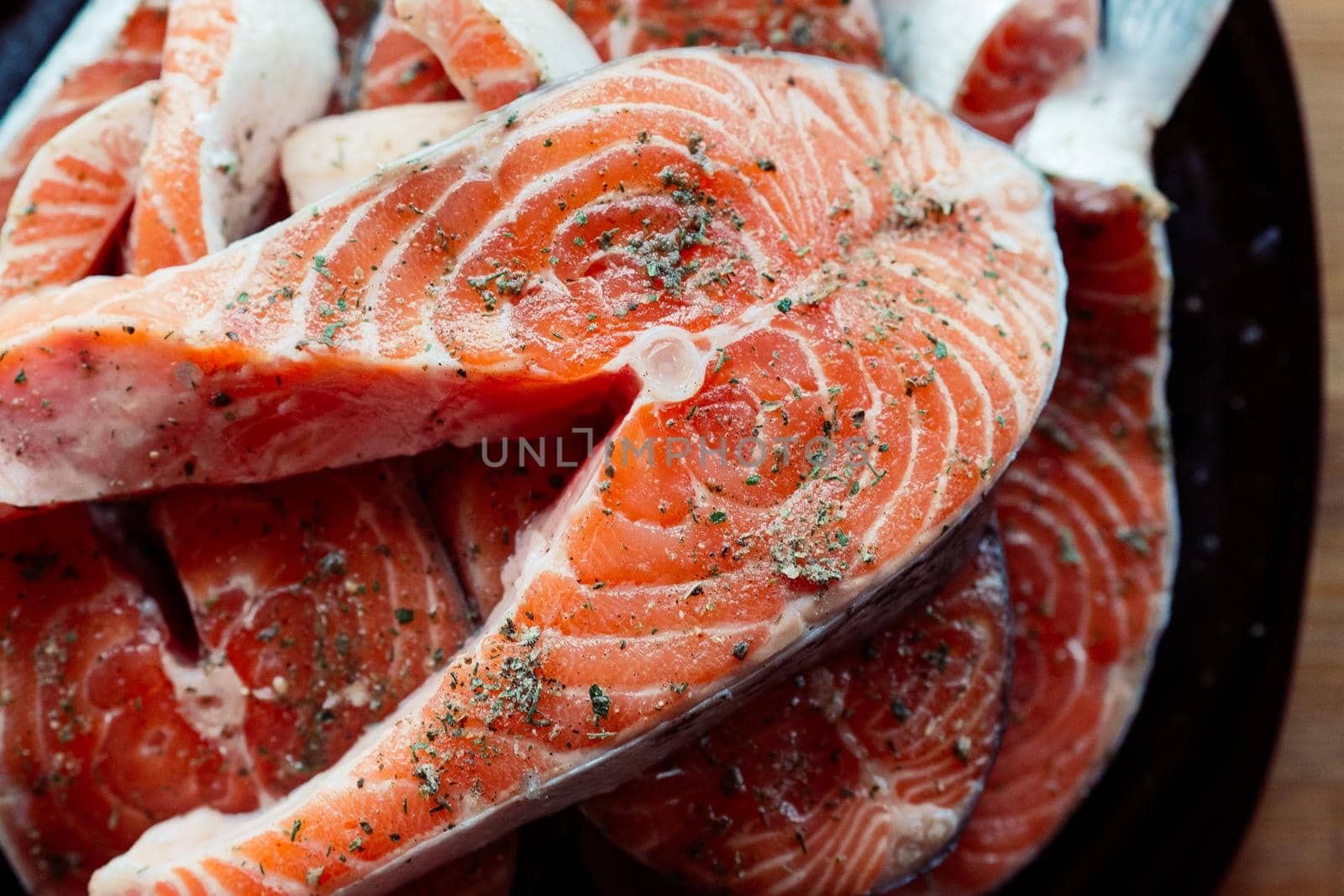 Red pickled fish food preparation seafood delicacy. High quality photo