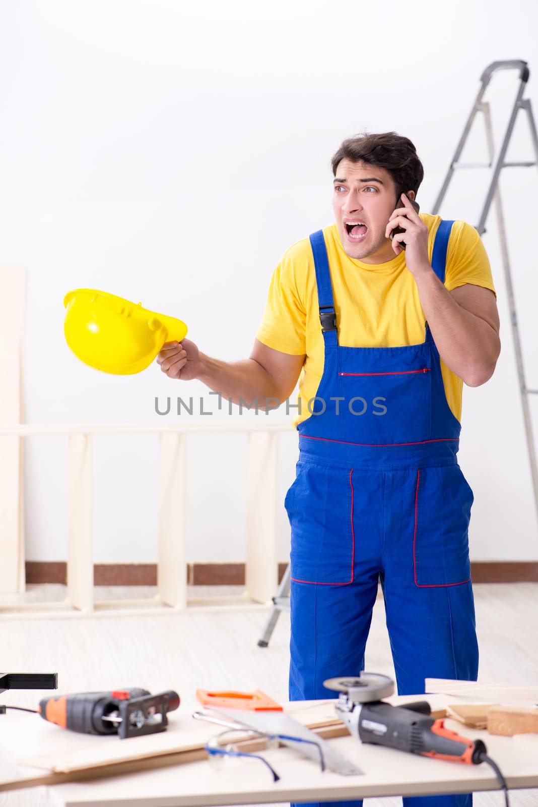 Floor repairman disappointed with his work 