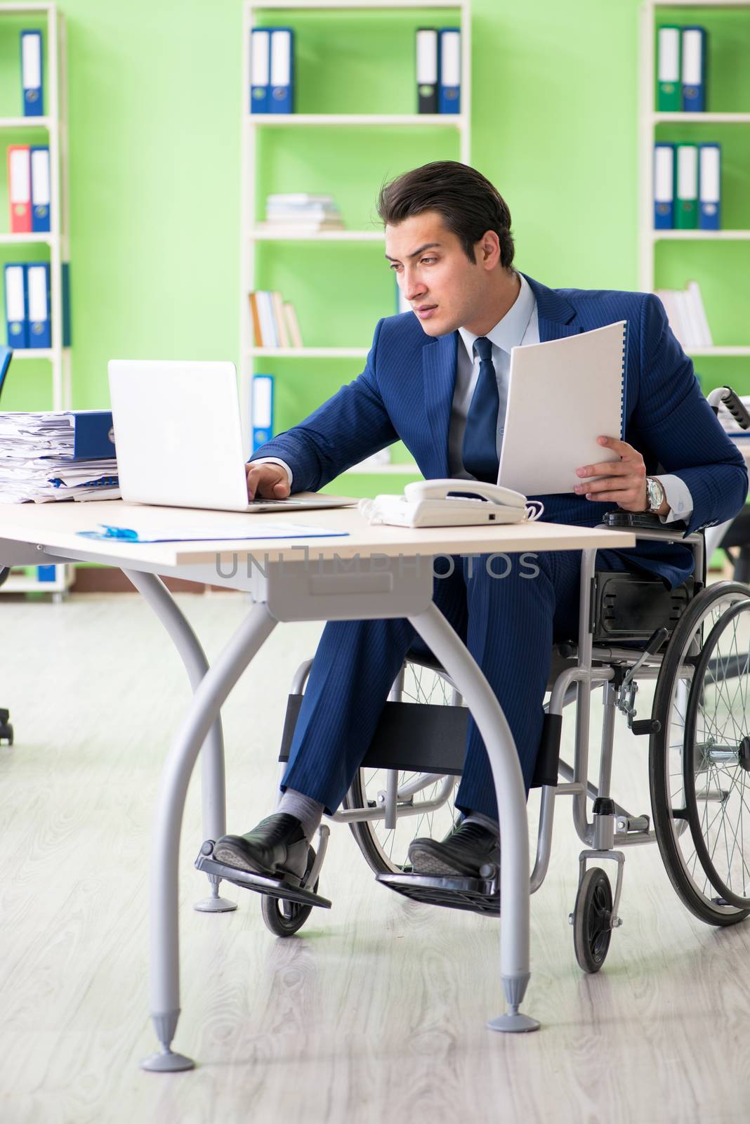 Disabled businessman working in the office
