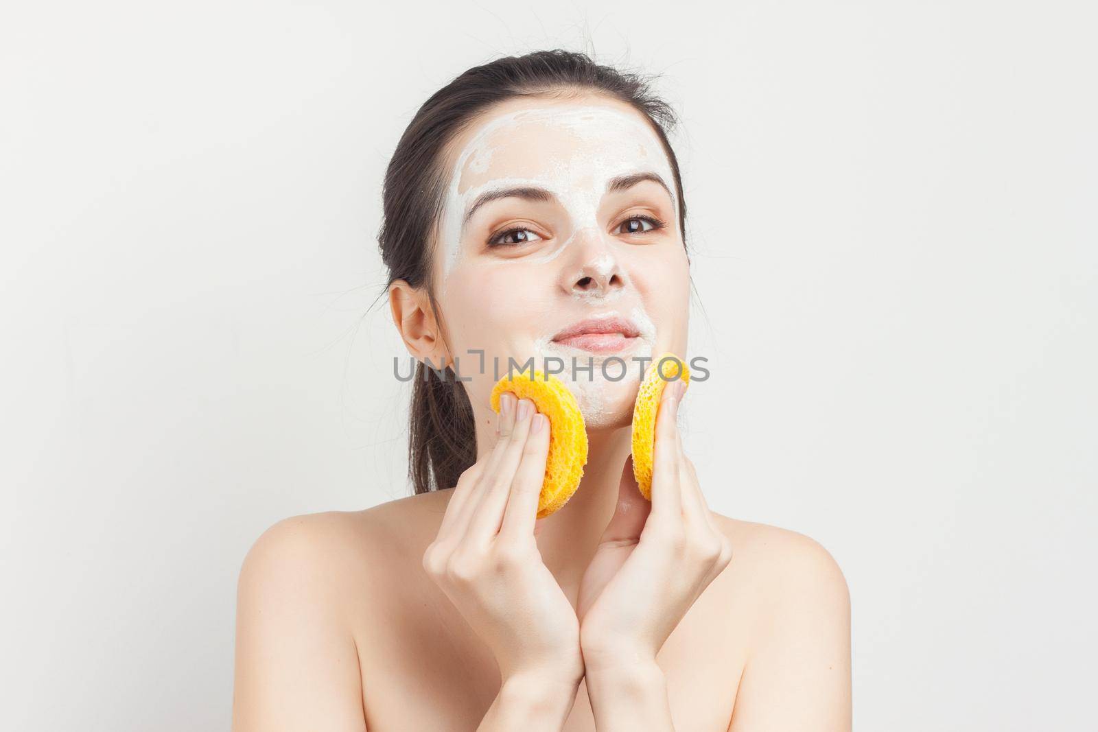 woman with cream mask on face skin care rejuvenation. High quality photo