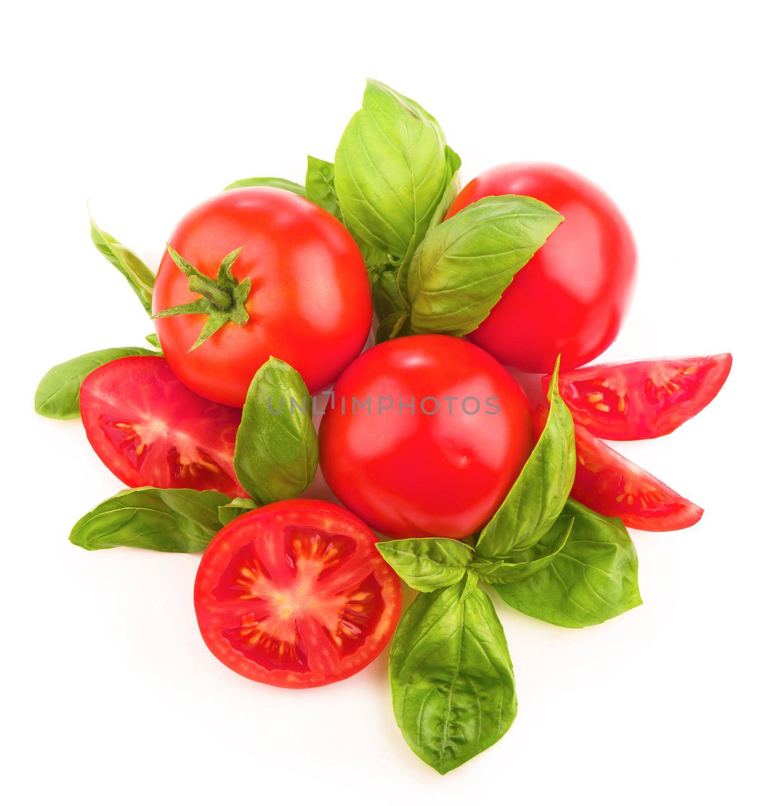 Tomatoes and basil leaves isolated on white close up. Vegetables by aprilphoto