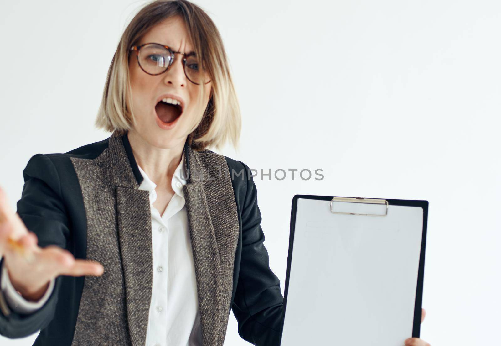 Woman Folder with documents business finance classic suit glasses. High quality photo