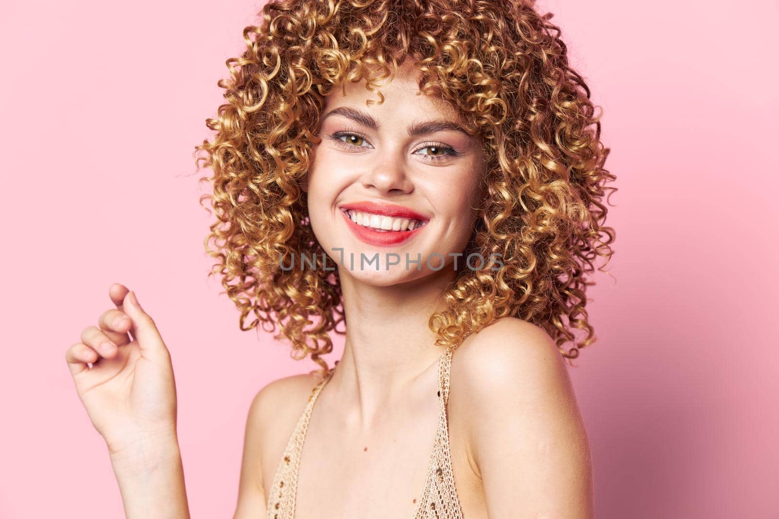 woman Smile bright makeup curly hair fun sequin shirt pink isolated background