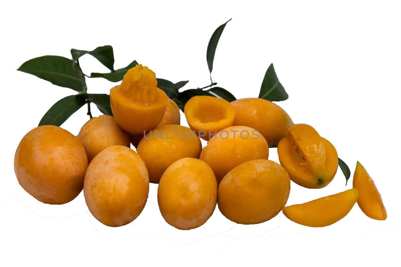 Fresh marian plums sweet yellow or mayong-chit with green leaf isolated on white background with clipping path. Concept of exotic tropical fruits, Selective focus.