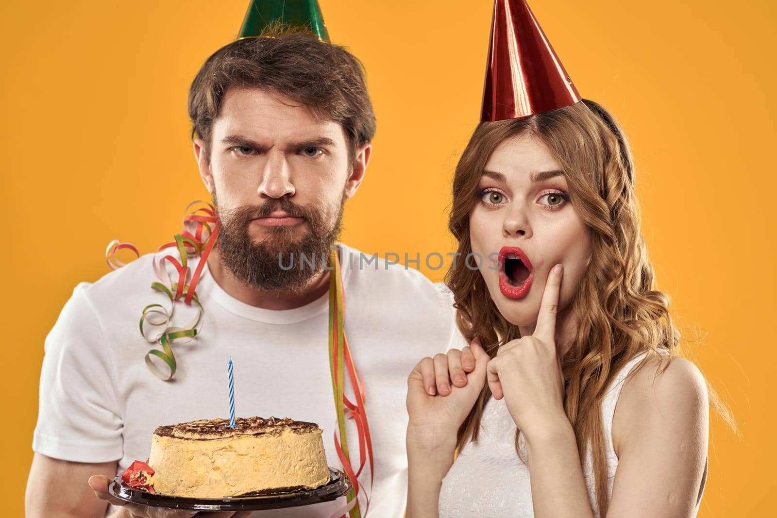 Merry time holiday cake different birthday yellow background. High quality photo