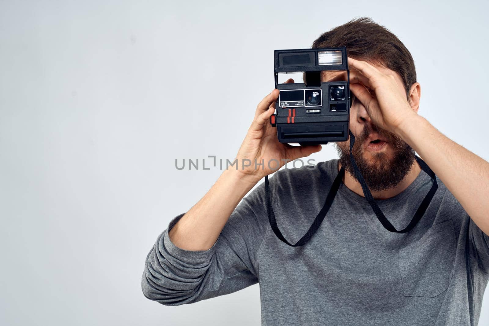 photographer professional creative technology paparazzi light background. High quality photo