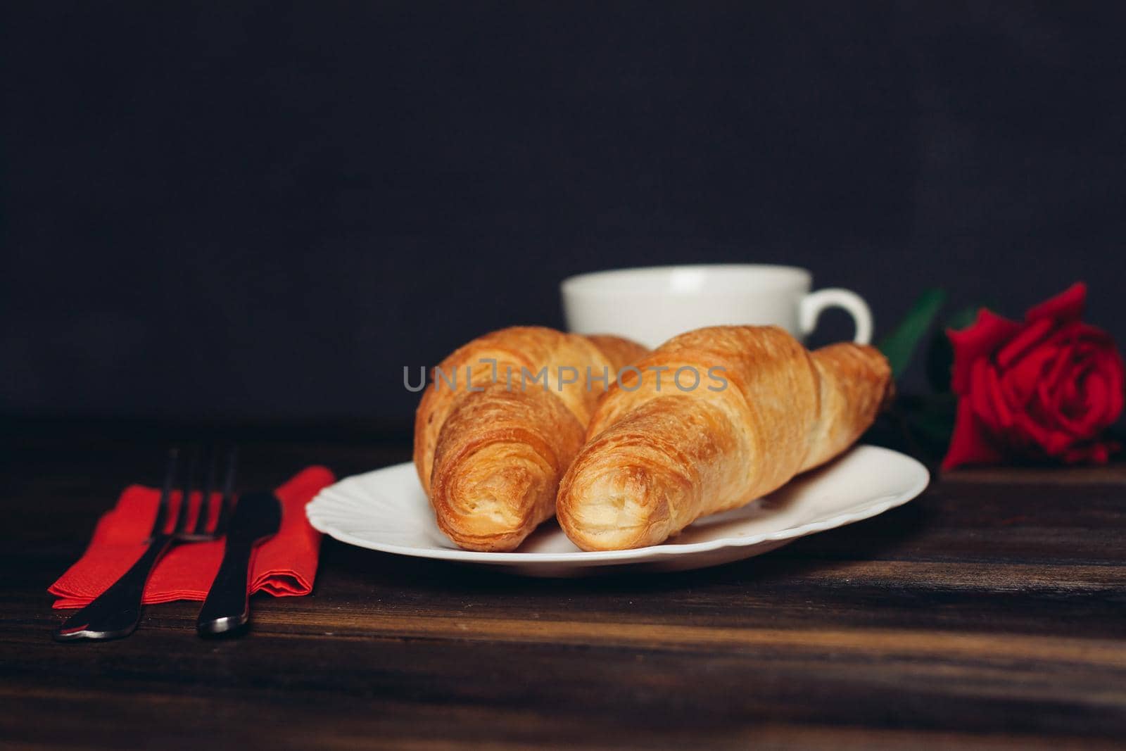 croissants on a plate a cup of coffee wooden table dessert by SHOTPRIME