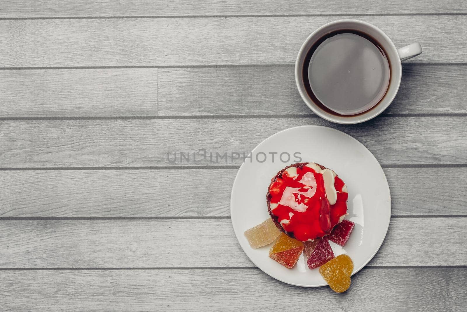 red cake on a plate dessert sweets candy snack close-up. High quality photo