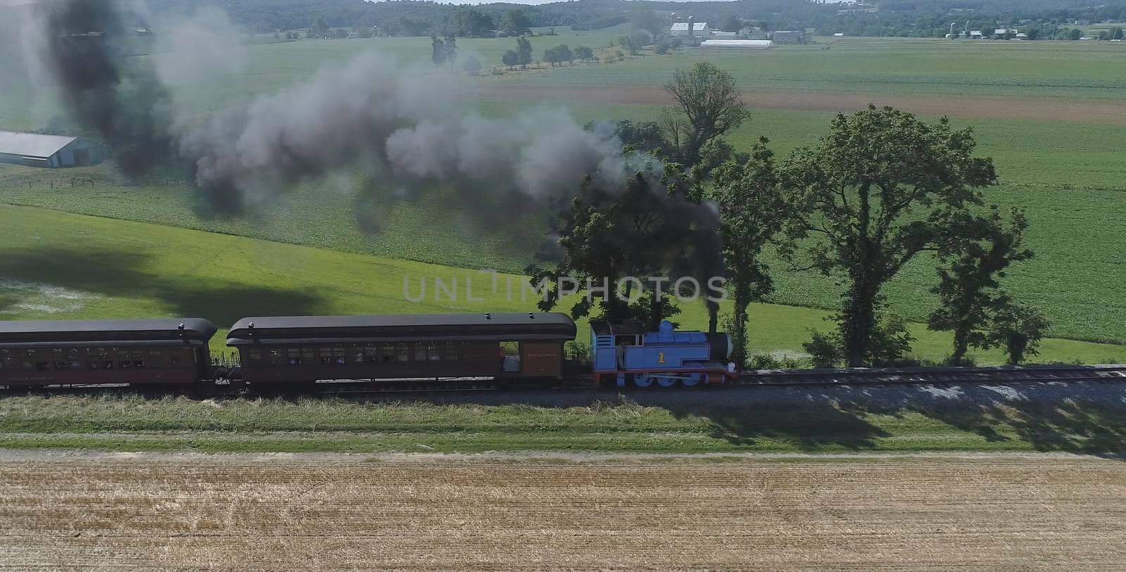 Ronks, Pennsylvania, June 2019 - Aerial View of Thomas the Tank Engine Puffing and Steaming along the Countryside