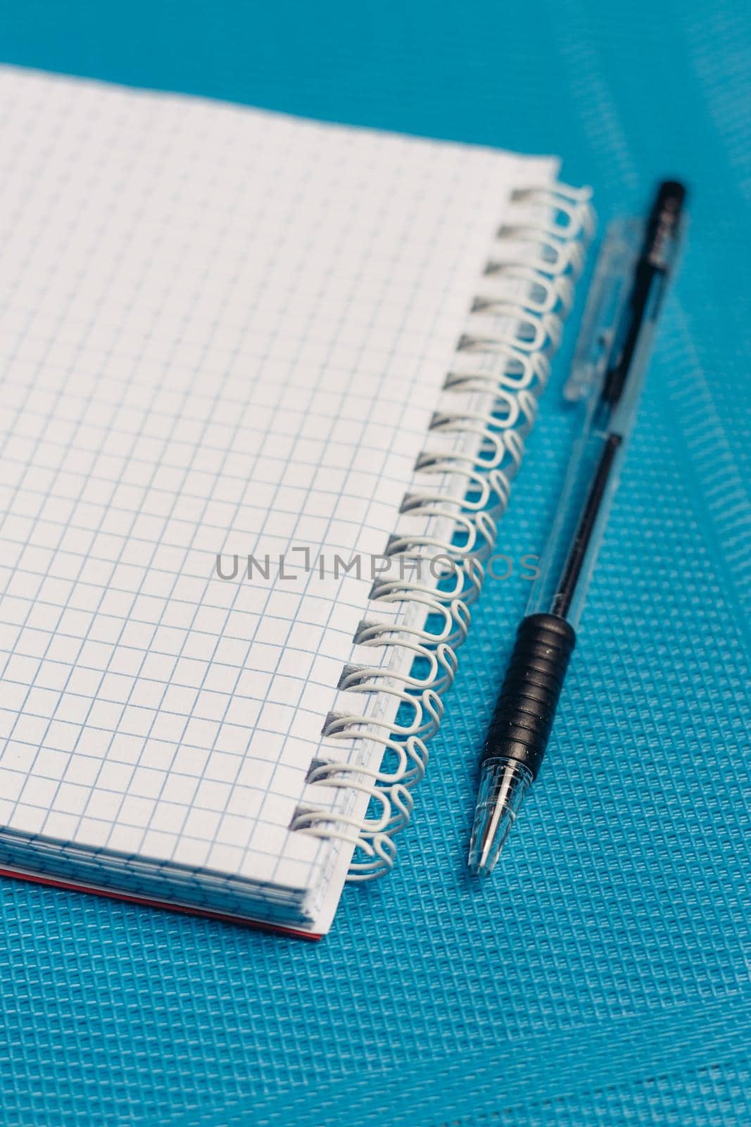 notepads work desk pen paper work close-up office by SHOTPRIME