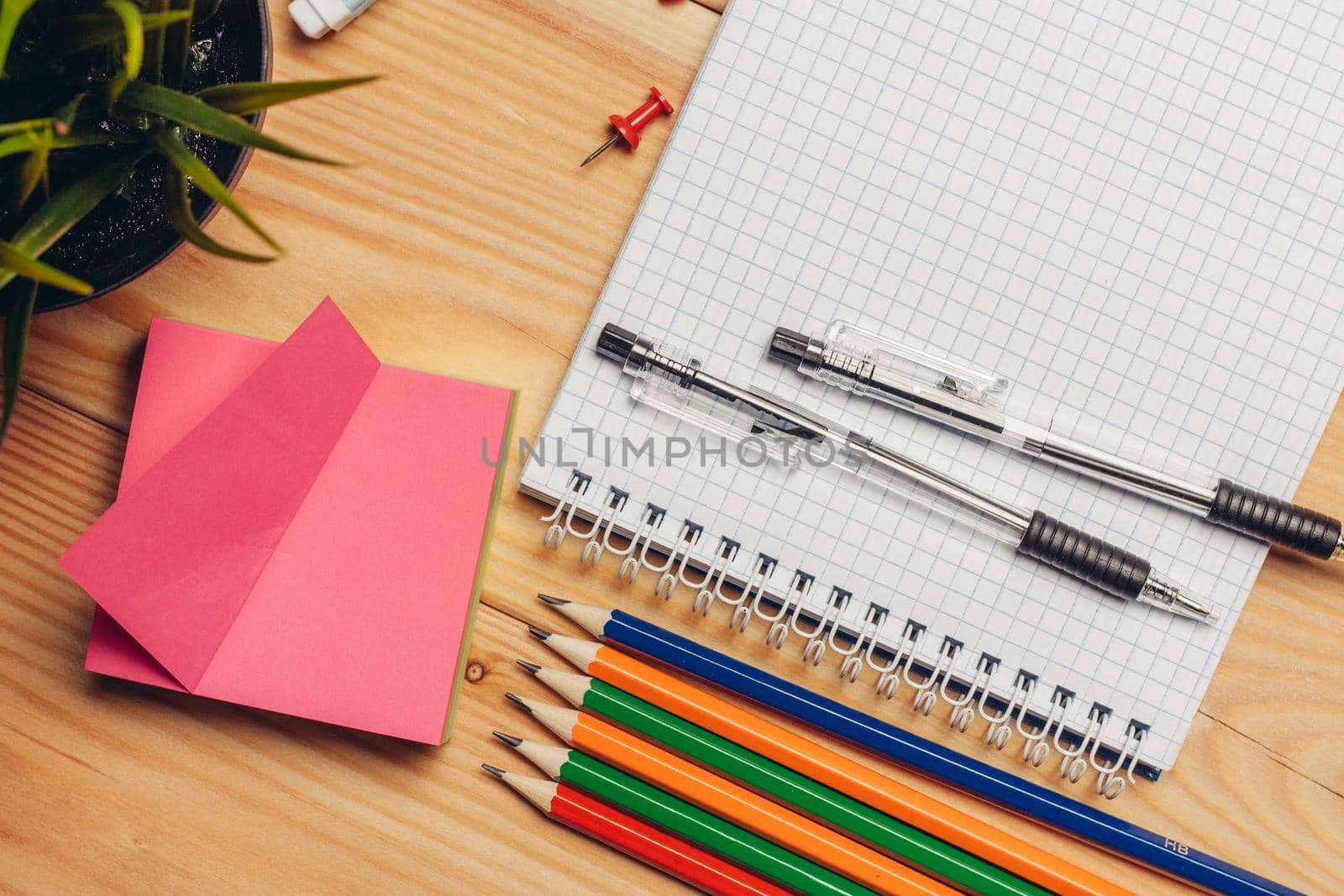 paper colored pencils scissors stationery school desk. High quality photo