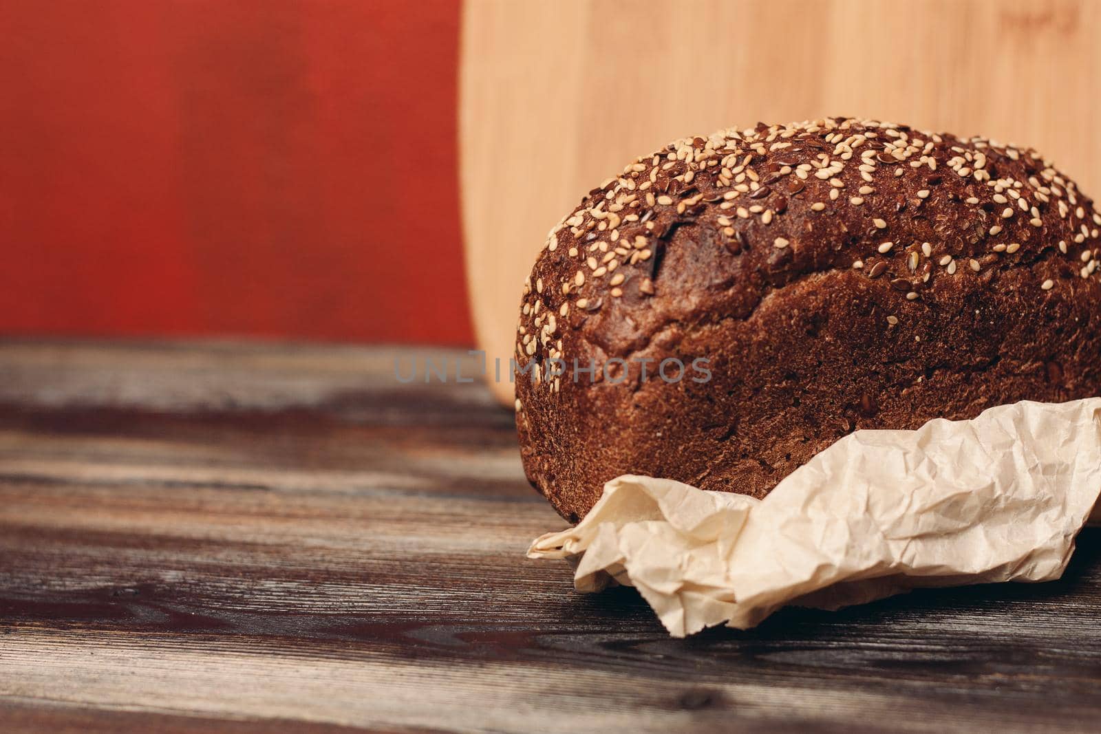 rye bread on a paper stand and a blackboard in the background. High quality photo