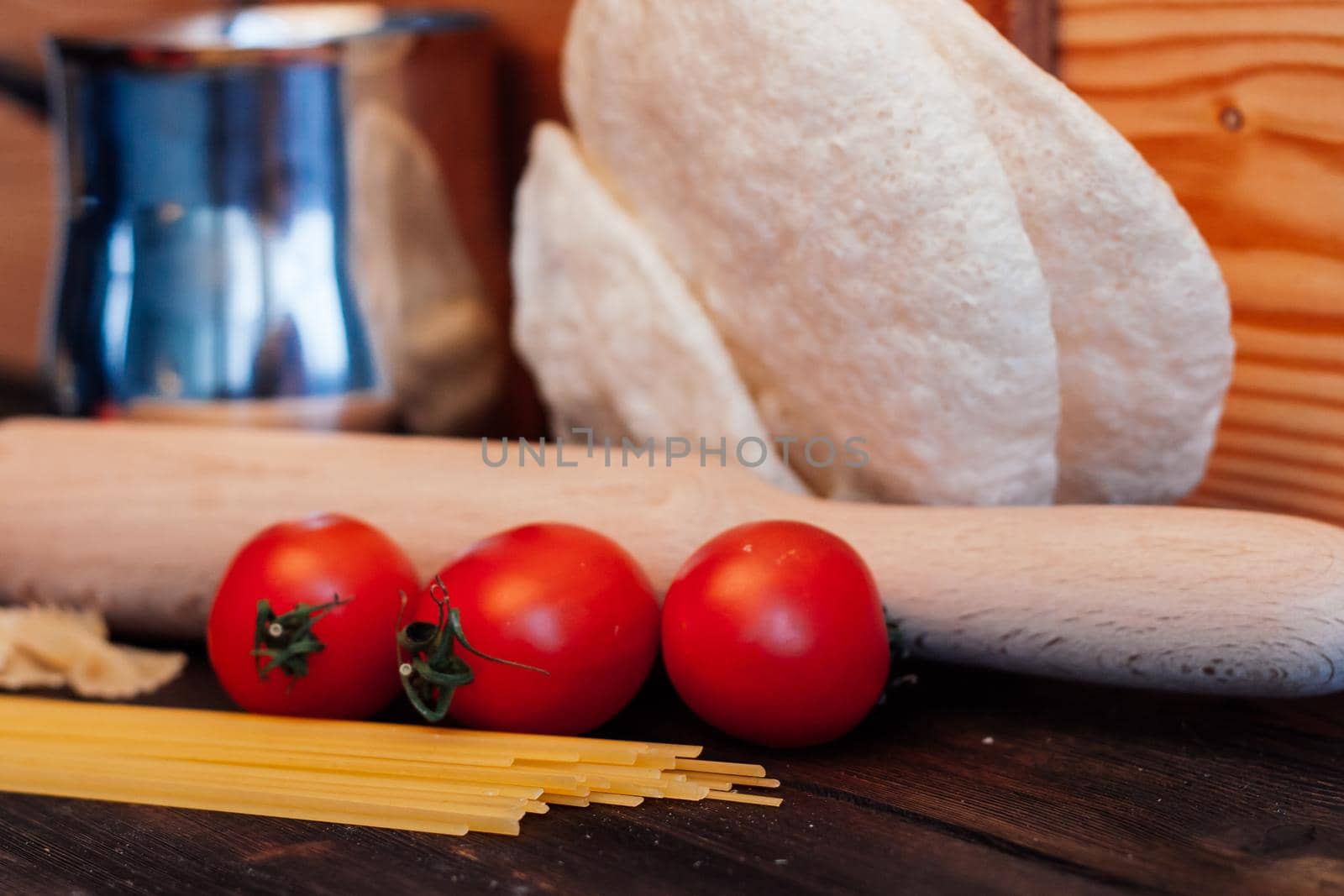 cherry tomatoes pasta ingredients for cooking italian cuisine. High quality photo