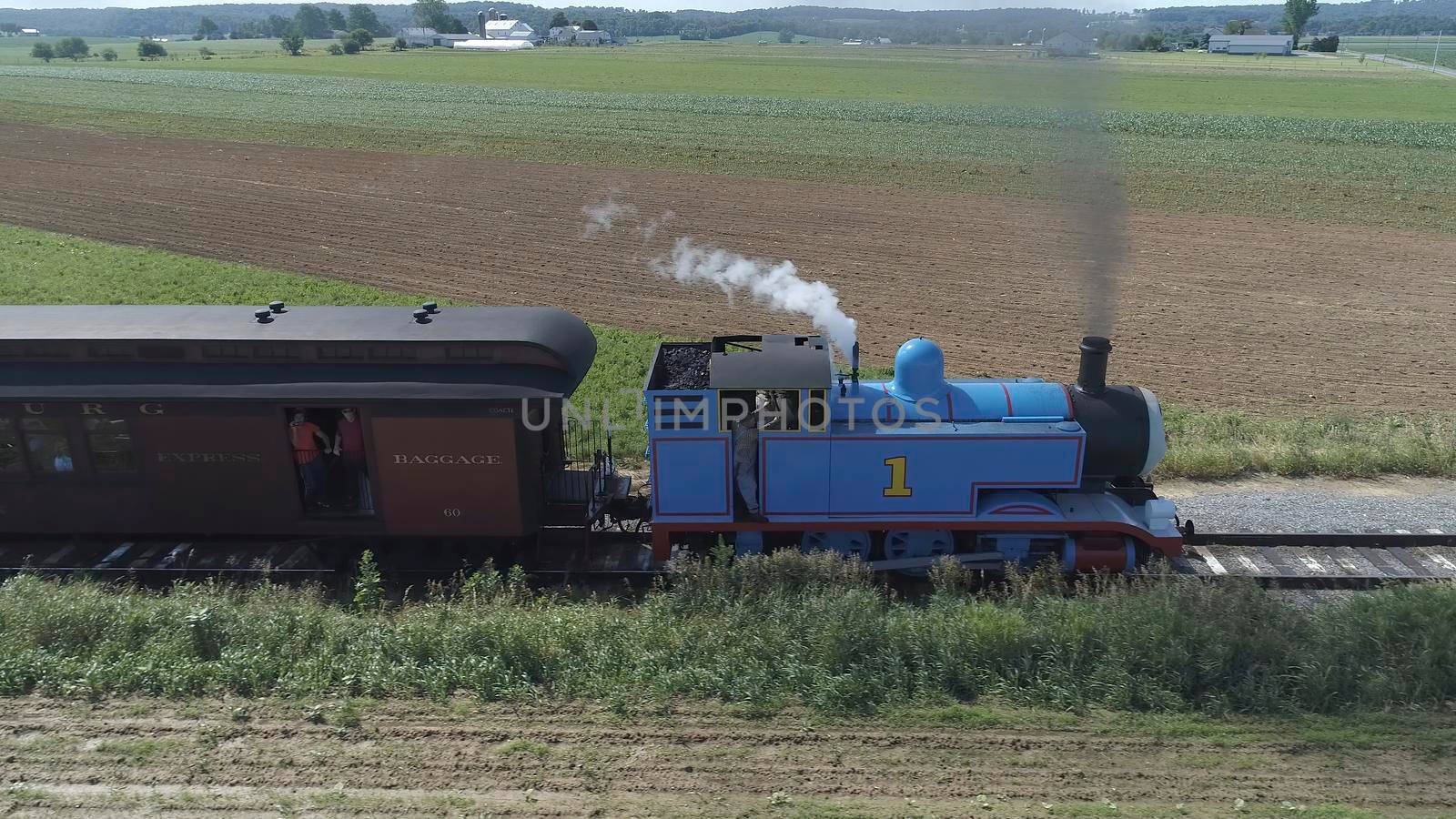 Ronks, Pennsylvania, June 2019 - Aerial View of Thomas the Tank Engine Puffing and Steaming along the Countryside