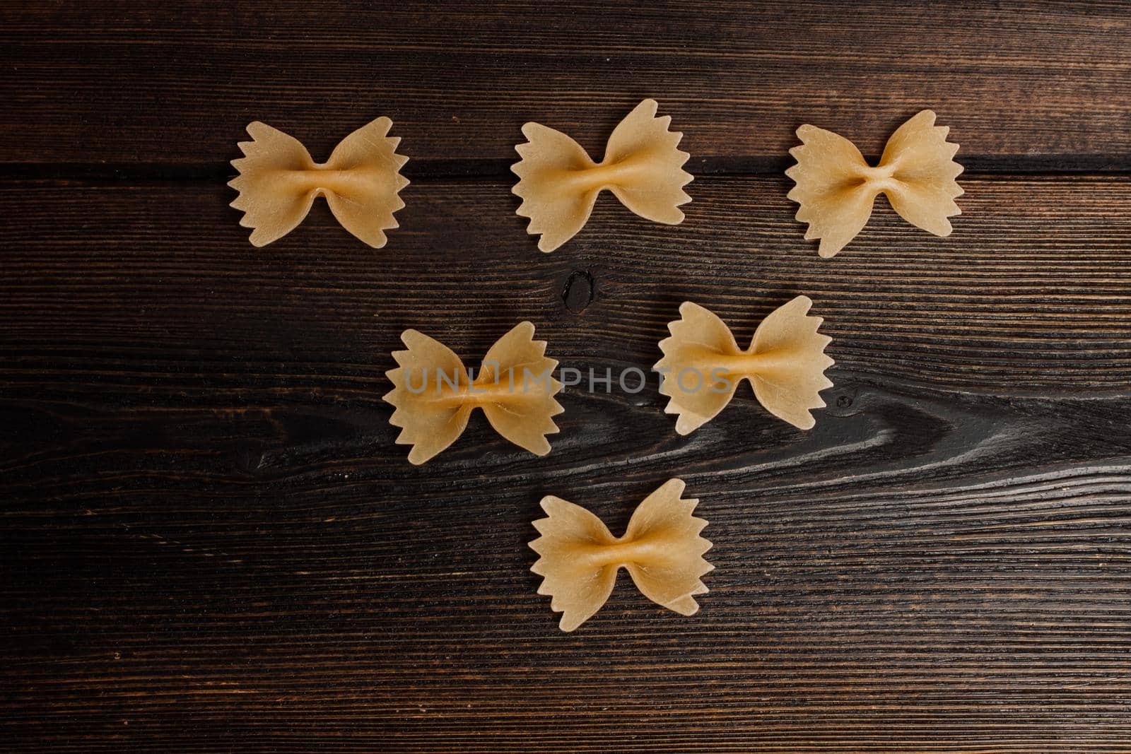 ingredients for italian pasta cherry tomatoes cutting board food preparation. High quality photo