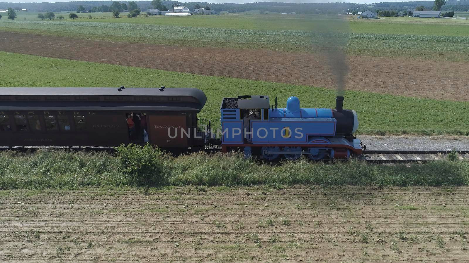 Ronks, Pennsylvania, June 2019 - Aerial View of Thomas the Tank Engine Puffing and Steaming along the Countryside
