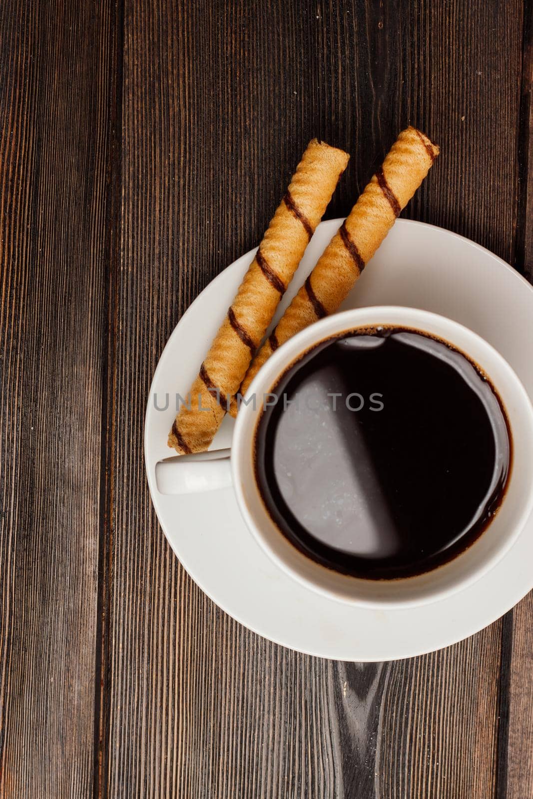 cup of coffee on a wooden table sweets breakfast top view by SHOTPRIME