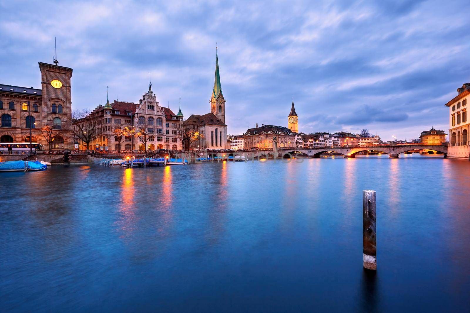 view on Fraumunster Church and Church of St. Peter at night, Zurich, Switzerland